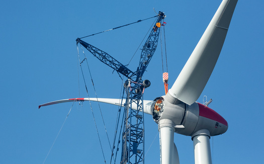 Reports show states across New England have to upgrade distribution systems to accommodate a peak load in 2050, which will be double what New England historically experienced. (Adobe Stock)
