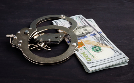 A report from the Brennan Center for Justice emphasized cash bail often allows release based on financial resources rather than public-safety considerations. (Vitalii Vodolazskyi/Adobe Stock)