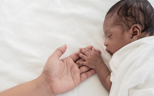 This year, the North Carolina Maternal Mortality Review Committee reported bias and discrimination contribute to traumatic and near-death experiences. (Adobe Stock) 