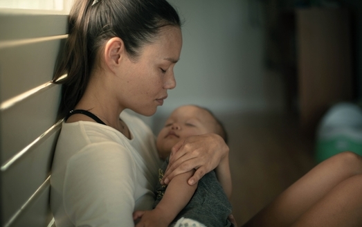 Health care professionals warn that untreated bouts of postpartum depression can lead to serious health consequences, both for the new parent and their child. (Adobe Stock)