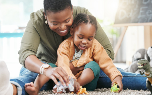 High prices and a high turnover rate of child care providers are not only affecting families but the state's economy. Census data show more than 15,000 people are not employed because they're caring for a child at home. (Adobe Stock) <br />