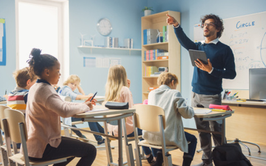 According to the National Education Association, American Education Week is meant to honor the team of people who work in U.S. public schools, including classroom teachers, bus drivers, cafeteria crews and administrative staff. (Adobe Stock)