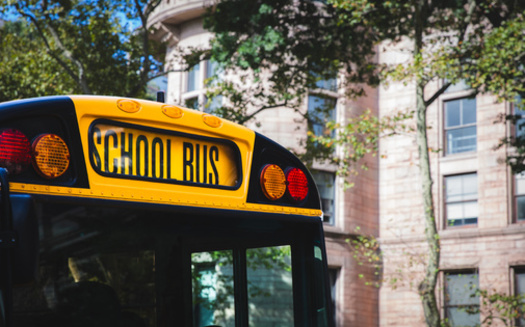 Support staff like school bus drivers help Washington state schools run. (teamjackson/Adobe Stock)