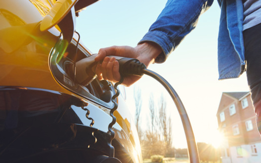 Roughly half of Maine's greenhouse-gas emissions come from the transportation sector. It is estimated the state will need more than 200,000 light-duty EVs on the road to reach its goal of net-zero emissions by 2045. (Adobe Stock)<br />