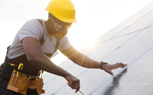 The Massachusetts climate law creates a new Office of Environmental Justice and Equity to help communities play an active role in the accelerated siting and permitting process for clean energy projects, and provides funds to help those communities with legal representation. (Adobe Stock)<br />