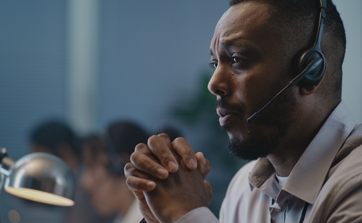 Job stress and poor pay are causing a high turnover rate for counselors at crisis centers handling calls for help from suicidal individuals, according to a report from the National Alliance on Mental Health. (Adobe Stock)