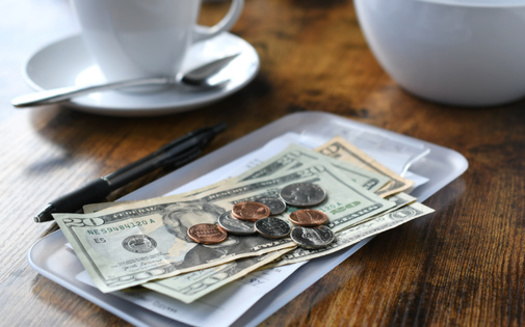 The phase-out of tipped wages in Michigan ties back to a 2018 ballot initiative, which sought to gradually increase the state's minimum wage for all workers, including those earning tips. (MargJohnsonVA/Adobe Stock)