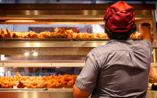 Many Americans with a minimum wage or low-paying job often need a second job to make ends meet. (Seika/AdobeStock)<br />