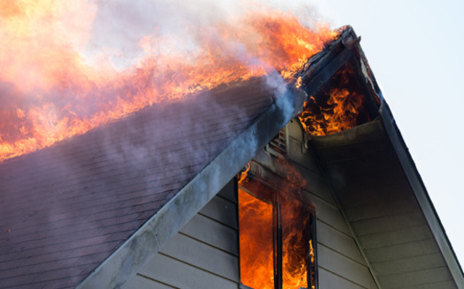 Houses are most likely to catch fire from the top down because of falling embers. (Jamie Hooper/Adobe Stock)