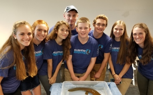 Chesapeake Bay Foundation Student Leadership Council members gather around an Eastern hellbender at the Pittsburgh Zoo in 2018. The students spearheaded the effort to designate the hellbender as Pennsylvania's official state amphibian. (Chesapeake Bay Foundation) 