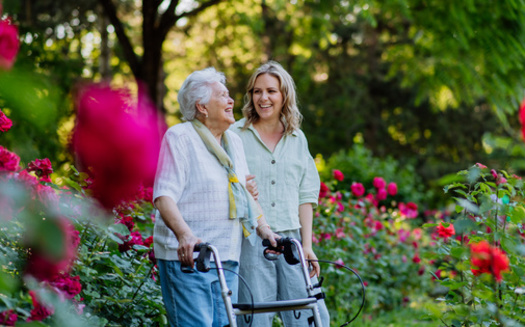 Family caregivers on average are spending 26% of their income on caregiving activities, according to a 2021 AARP survey. (Adobe Stock)
