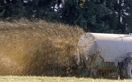 An approved winter manure-spreading practice requires Pennsylvania farmers to maintain a 100-foot setback from water sources, including streams, lakes, ponds, sinkholes, wells and above-ground drainage inlets. (Andov/Adobe Stock)