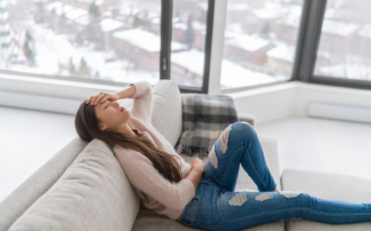 As winter drags on, 40% of Americans report feeling down, with 41% sleeping more, 28% feeling fatigued, and 27% feeling depressed, according to the American Psychiatric Association. (Adobe Stock) 