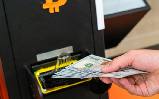 Cryptocurrency kiosks can pop up in common spaces such as gas stations but fraud experts said because the industry is largely unregulated, it is hard for the victim of a scam to get their money back after it is deposited. (Adobe Stock)
