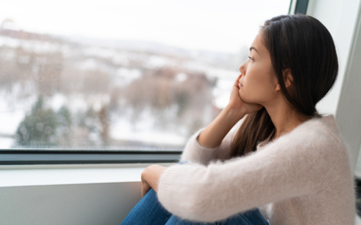 In a recent study, women were more likely than men to say their mood declines during the wintertime. (Adobe Stock) 