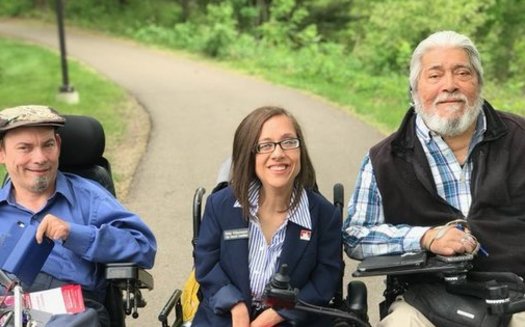 Nikki Villavicencio, center, serves on the Maplewood City Council and is a board chair with the Minnesota Council on Disability. She's part of a coalition of self-advocates warning about the effect Medicaid cuts would have on those with disabilities. (Photo courtesy of Villavicencio)