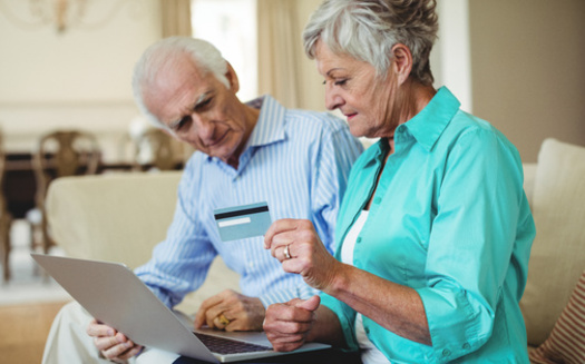 In a new AARP survey, 37% of older adults with credit card debt report their debt level is higher than it was a year ago. (Adobe Stock)