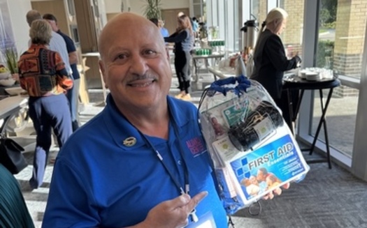 Eliseo Santana, the Gulf Coast Region manager for the Alianza Center, which serves the Puerto Rican and Hispanic communities, showcased the first-aid kits they distribute after hurricanes. (Trimmel Gomes)