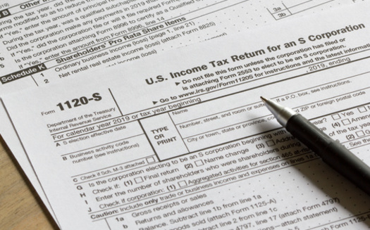 Democratic lawmakers' proposed state budget includes increasing the payroll tax for large employers, generating about $2.3 billion a year. (Tada Images/Adobe Stock) 