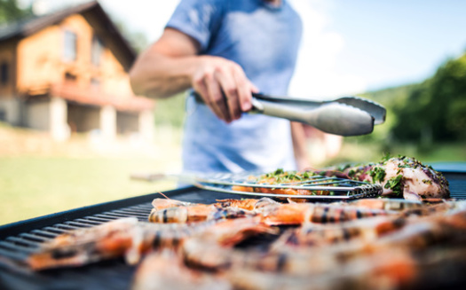 Environmental experts say you shouldn't stress out about the carbon footprint from grilling because it is meant to be an enjoyable experience. Still, they urge trying "eco-friendly" ways of grilling, including the cleaning products you use. (Adobe Stock)
