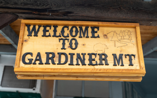 Yellowstone National Park supports about 8,500 jobs in surrounding communities including Gardiner, Montana, which in 2023 had a population of 791. (Melissa MN/Adobe Stock)