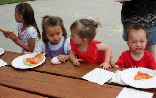 PHOTO: Kids eating lunch in a park. Credit: Deborah Smith