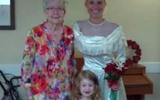 PHOTO: Maple Creek resident with daughter modeling her wedding dress.  Credit: Lutheran Social Services of Michigan