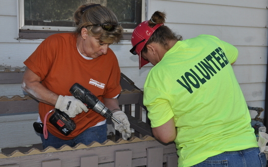 PHOTO: Volunteers working on a home last year for the National Day of Service. Courtesy of Habitat for Humanity of Laramie County.