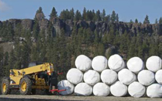 PHOTO: Baled poultry litter. Photo by White River Fertilizer Supply.