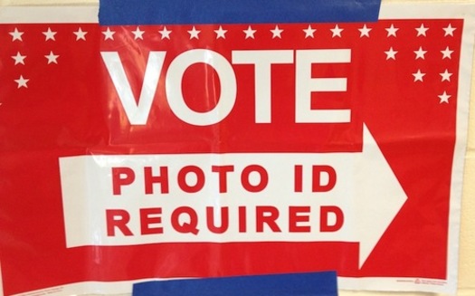 Photo ID Required - Credit Blake Farmer