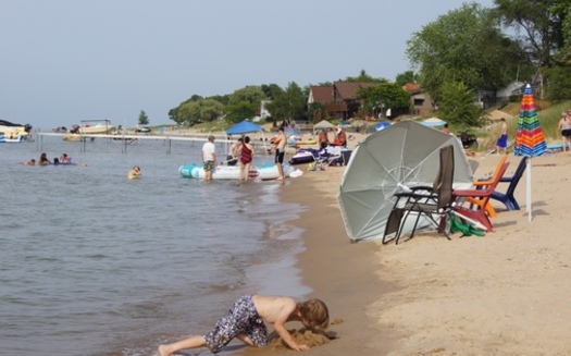Millions of people flock to Michigan beaches in the summer. Recent cuts to environmental cleanup could threaten the quality of those beaches.