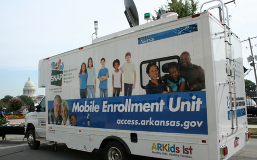 A cut in SNAP benefits this fall will reduce food subsides for Arkansas' low-wage families, according to the state's food banks. PHOTO of a mobile SNAP enrollment truck courtesy of Arkansas Advocates for Children & Families