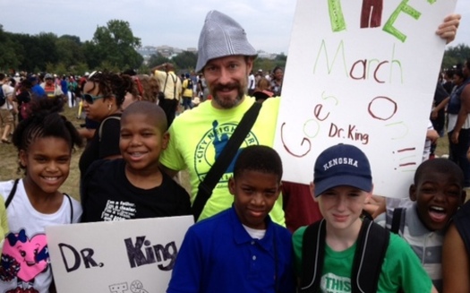 PHOTO: Students from Baltimore's City Neighbors Charter School carried signs on the National Mall as part of the events commemorating the March on Washington.