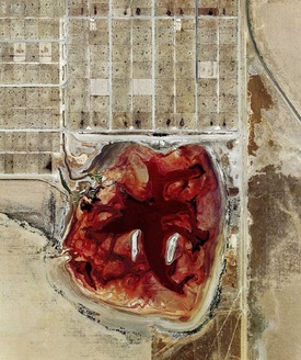 PHOTO: An aerial view of a feedlot. The United Nations' Food and Agriculture Organization says large factory farms are increasing climate-changing pollution. Photo credit: Mishka Henner.