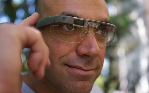 PHOTO: Google Glass (above), although not yet available to the general public, joins smart watches, wrist phones and all kinds of wearable cell phones and digital devices as highly desirable consumer products with the approach of the holiday season. Scientists are issuing health warnings, however. Courtesy Wikipedia.org.