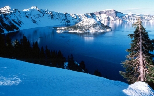 PHOTO: What a view  if you can get there. Crater Lake National Park access depends in part on keeping the roads open, and that depends on a sufficient budget. Photo credit: National Park Service.
