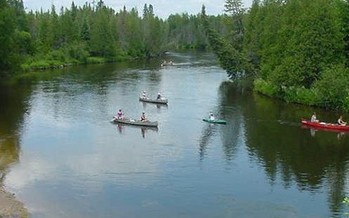 PHOTO: People come from around the country to enjoy Michigan's Au Sable River, which is why one group wants the federal government to study the potential risks of a 60-year-old oil pipeline that runs beneath it. Photo courtesy of Wikimedia Commons.