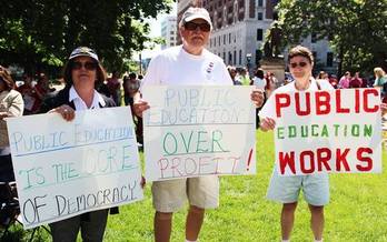 Evaluations linked to test scores, higher health-care costs and pay freezes are among the challenges faced by Michigan teachers. (Michigan Education Association)