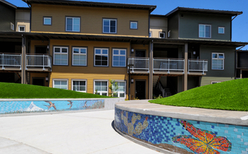 Farmworker Housing Development Corp. builds housing, such as the building above, for farmworkers and their families. (FHDC)