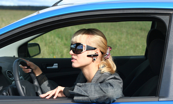 A new law regarding cell-phone use on Wisconsin roads goes into effect October first. (Natalia Belatelova/iStockPhoto.com)