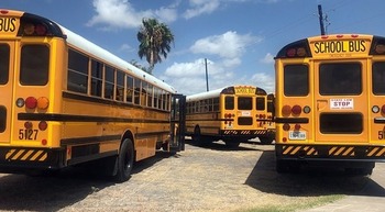 The state of Texas is warning school districts that busing students to polling places could constitute 