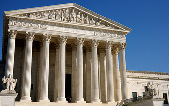 Washington state anti-discrimination laws remain intact despite the U.S. Supreme Court's decision to side with a Colorado bakery owner this week for refusing to serve a same-sex couple. (Davis Staedtler/Flickr)