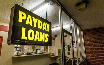 Most payday loan borrowers in Michigan re-borrow within 60 days. (Tony Webster/Flickr)