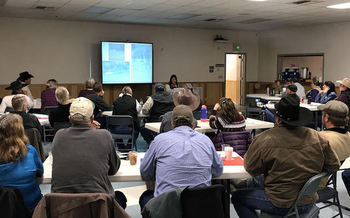 The workshop on ranchers and wolves is exploring such topics as range-riding and wolf behavior. (Defenders of Wildlife)