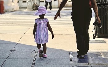 A child's positive relationship with a parent or caring adult can be good for their health later in life. (susanjanegolding/Flickr)